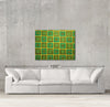 Yellow fusion sample canvas art on a wall with sofa